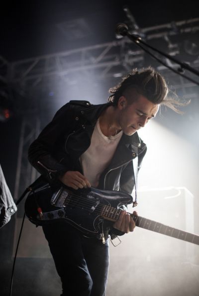 Matt Healy with a guitar